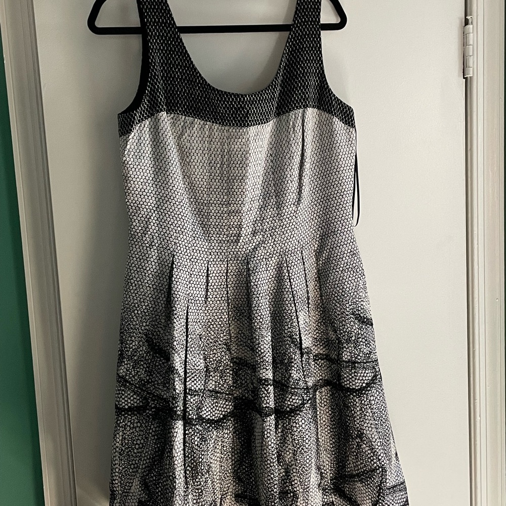 Knee length, light weight “fit and flare” black and white dress